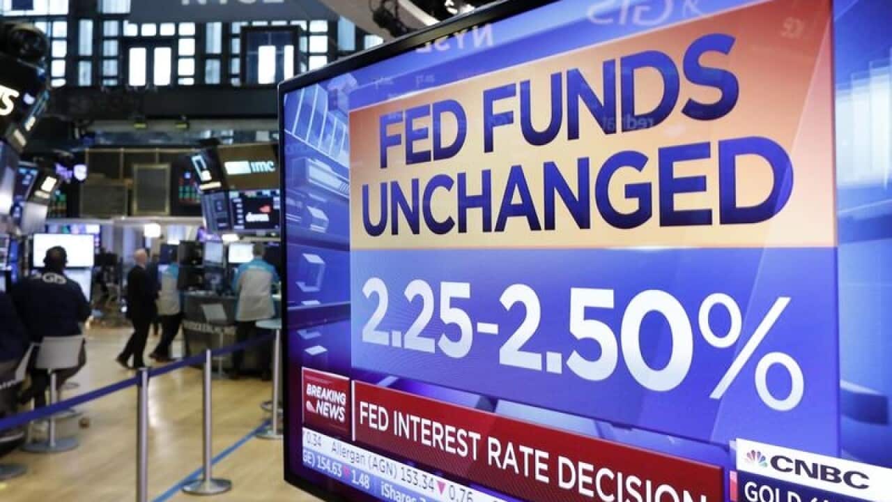 A screen shot at the NYSE showing the Fed's rate decision