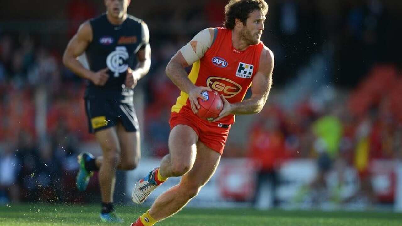 Suns player Campbell Brown looks on during the Round 18 AFL match.