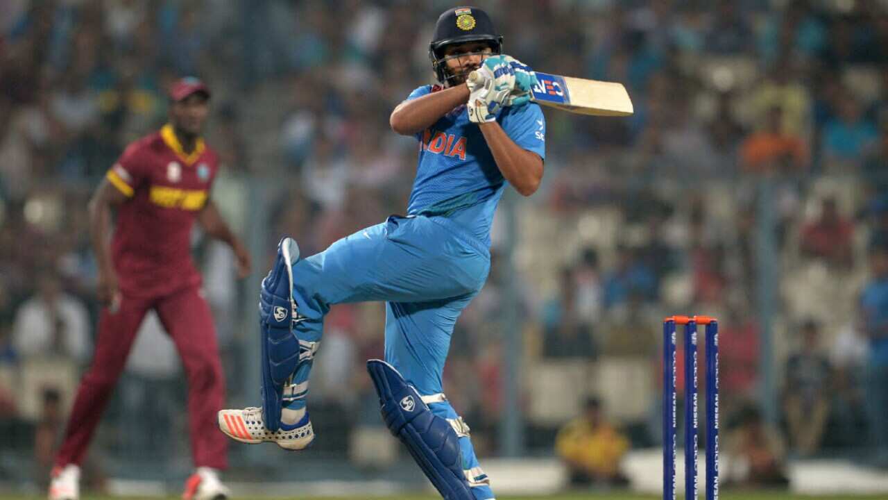 India's Rohit Sharma plays a shot during a warm-up match between India and West Indies for the World T20 cricket tournament at The Eden Gardens Cricket Stadium in Kolkata on March 10, 2016. (Getty Images-AFP-Dibyangshu Sarkar)