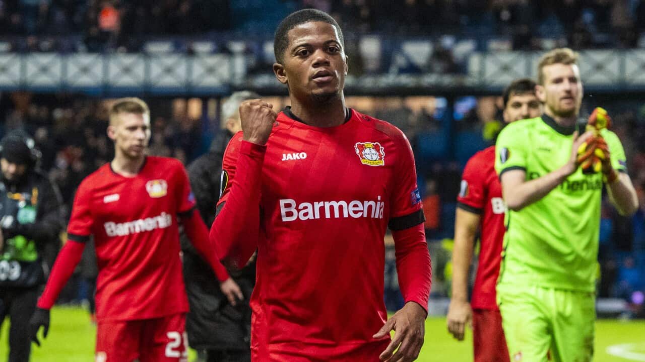 Leon Bailey celebrates a Bayer Leverkusen victory