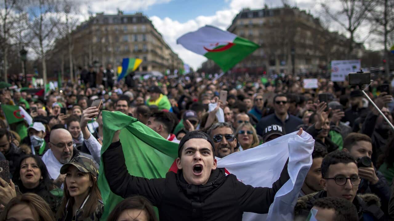 Members of the Algerian community in Paris protest against the fifth term of Algerian President Abdelaziz Bouteflika.