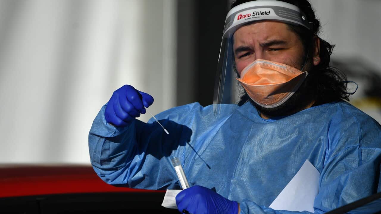 Members of the public are tested at a pop up COVID clinic at Roselands shopping centre in Sydney, Friday, July 30, 2021. The stay-at-home orders for coronavirus-hit Greater Sydney and surrounds have been tightened with non-essential retail to close and al