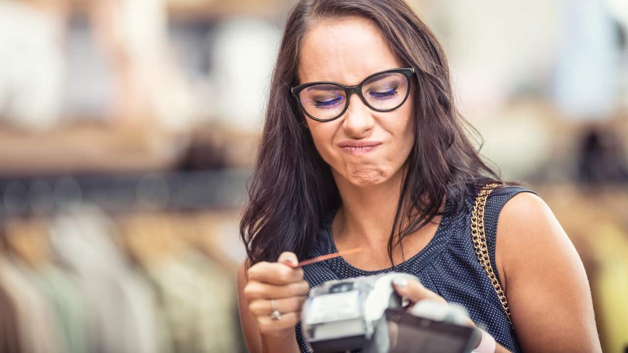 Woman unhappy about payment declined on the terminal while trying to use her credit card.