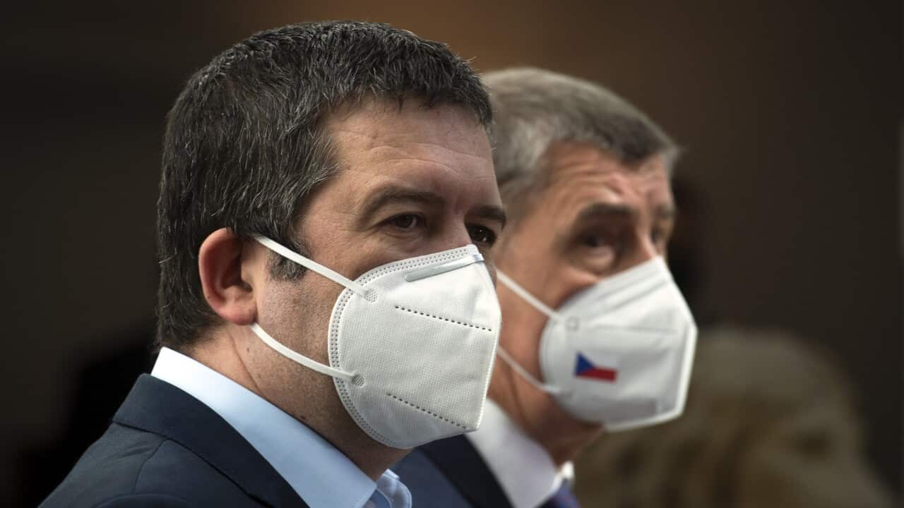 Czech acting Foreign Minister Jan Hamacek, left, and Prime Minister Andrej Babis speak during a press in Prague