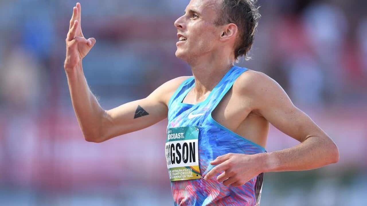 Ryan Gregson reacts after winning the Mens 1500m