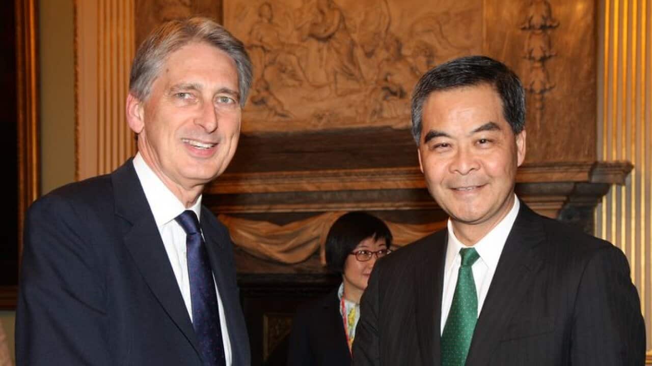 Former Foreign Secretary Philip Hammond meeting former Hong Kong Chief Executive CY Leung (R) in London, 15 October 2015.