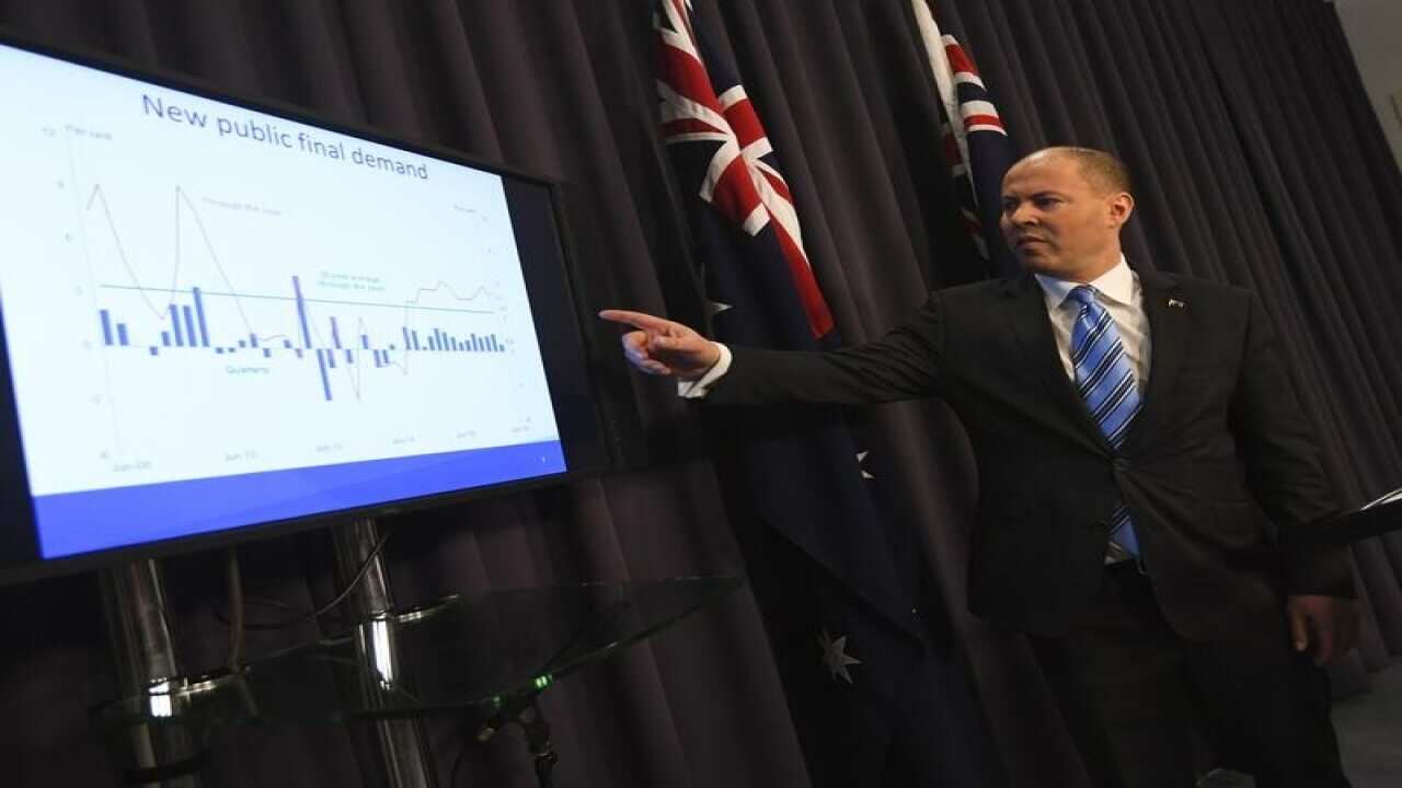 Treasurer Josh Frydenberg speaks during a press conference.