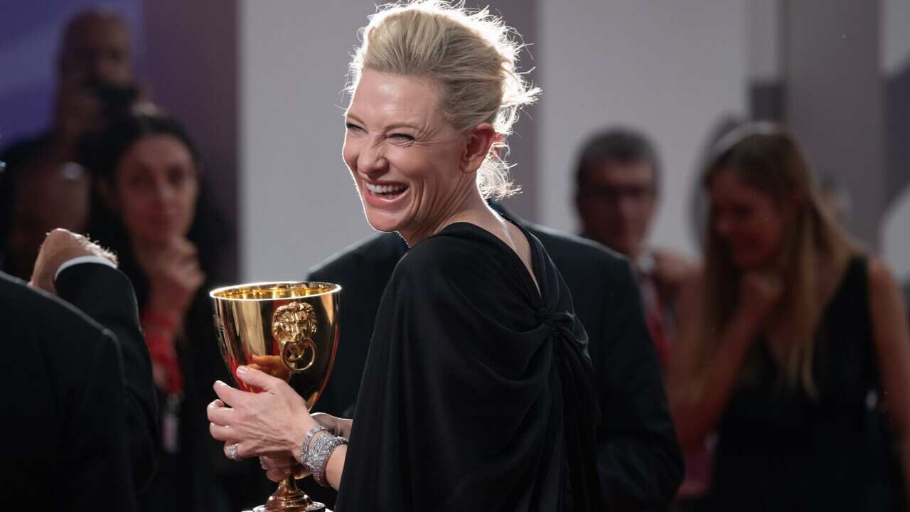 Cate Blanchett poses with the Coppa Volpi for Best Actress for "Tar" during the award winners photocall at the 79th Venice International Film Festival on September 10, 2022 in Venice, Italy.