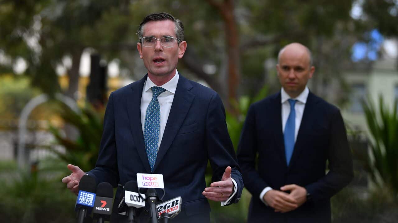 NSW Premier Dominic Perrottet (left) and NSW Treasurer Matt Kean speaks to the media during a press conference in Sydney, Tuesday, October 12, 2021.