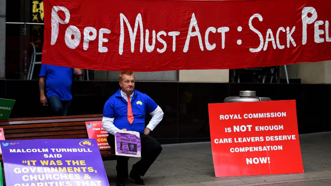 Abuse survivors outside a royal commission hearing in Sydney