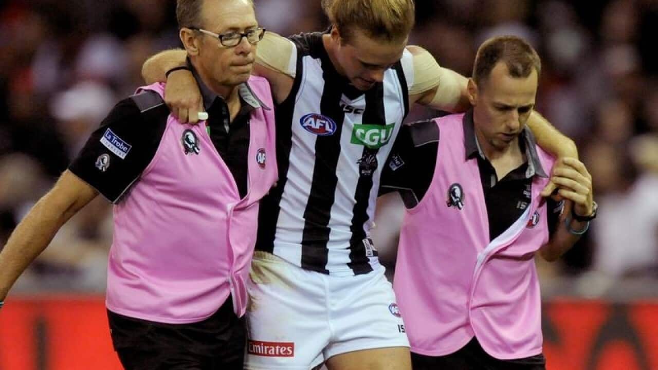 Collingwood physician Chris Bradshaw (L)