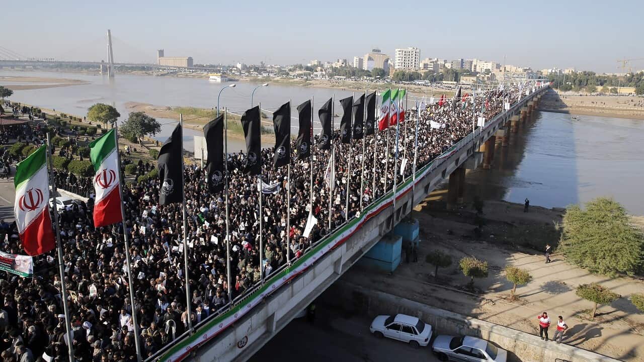 Iranians take part during the funeral ceremony for the slain general.