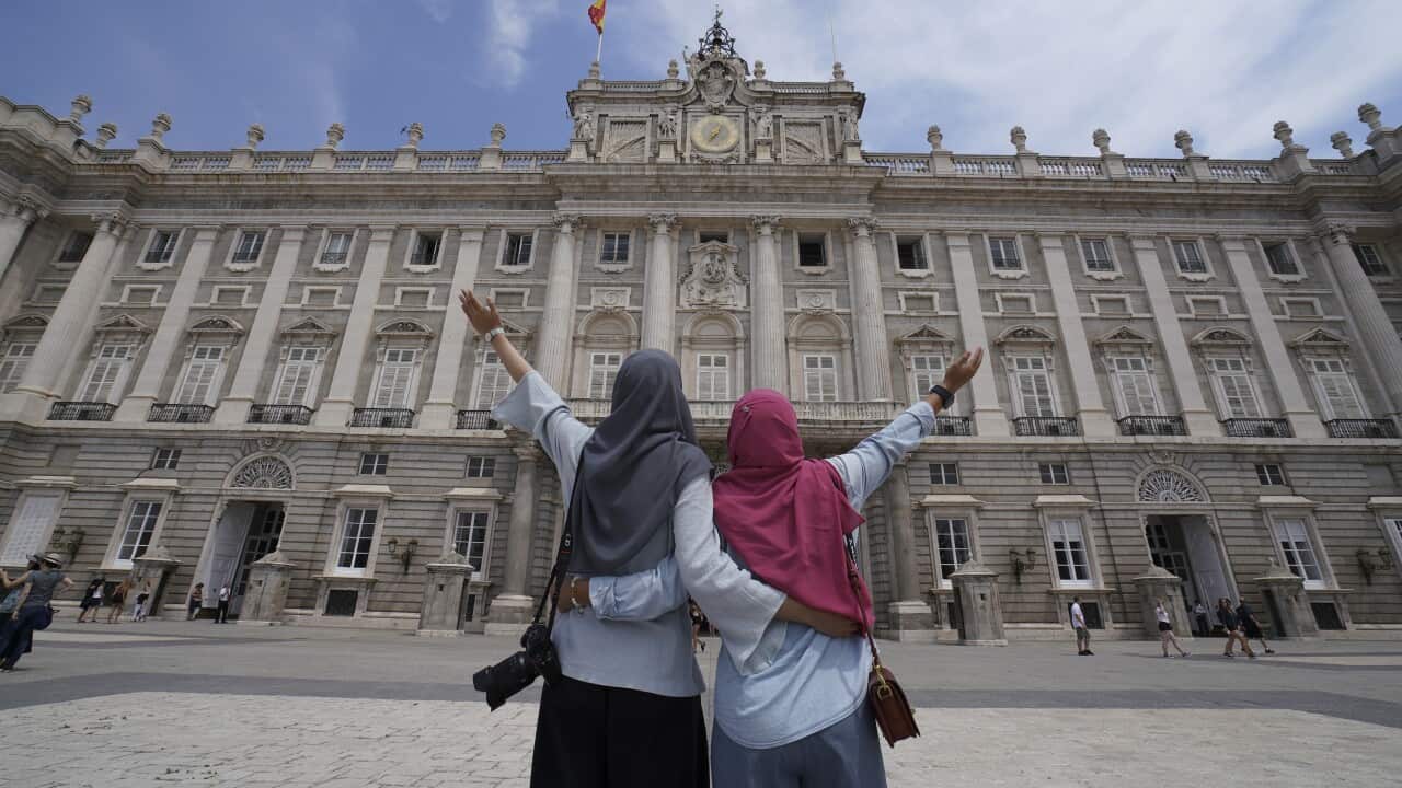 Two Muslim women sightseeing in Madrid.