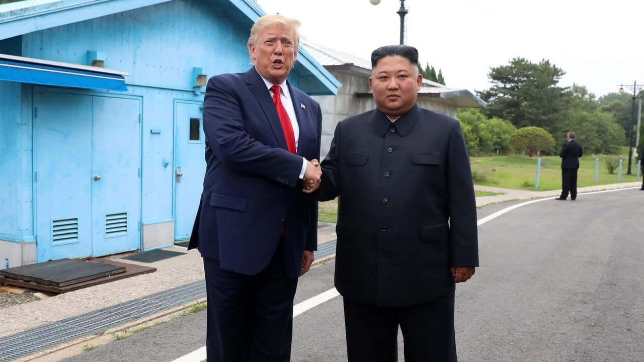 US President Donald Trump and North Korean leader Kim Jong Un shake hands in border village of Panmunjom in the Demilitarized Zone.