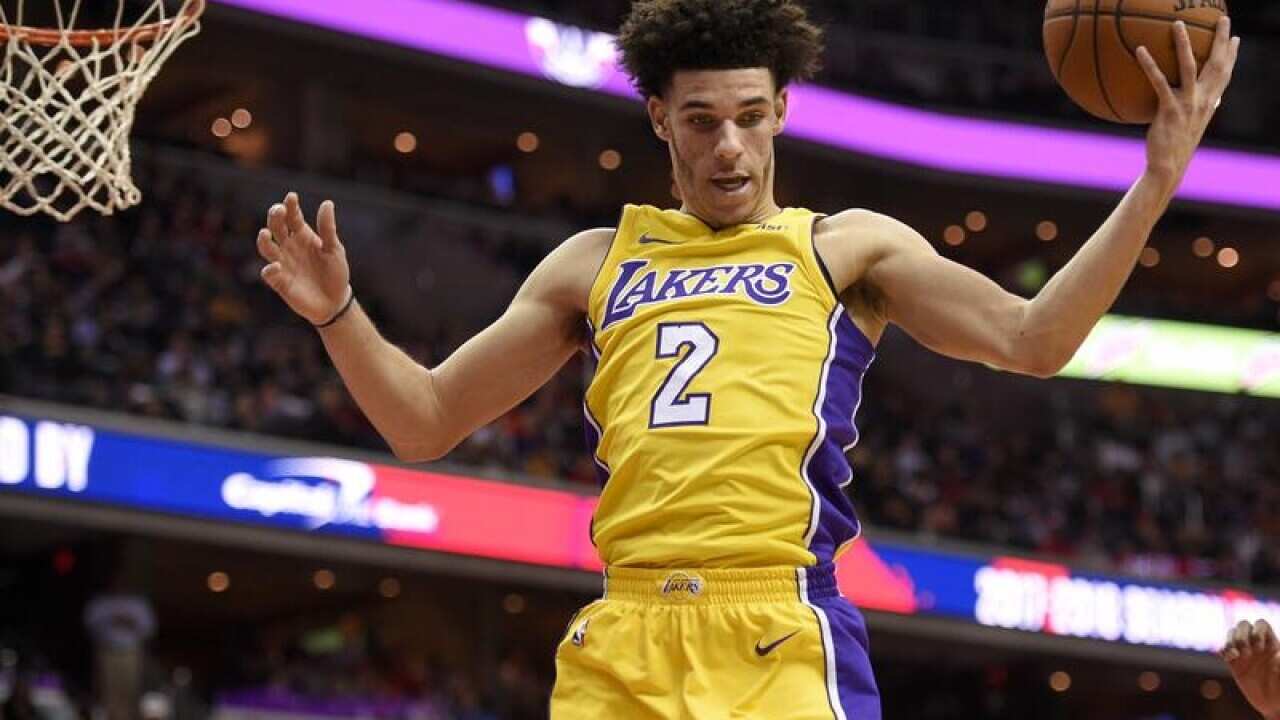 Los Angeles Lakers guard Lonzo Ball grabs the ball