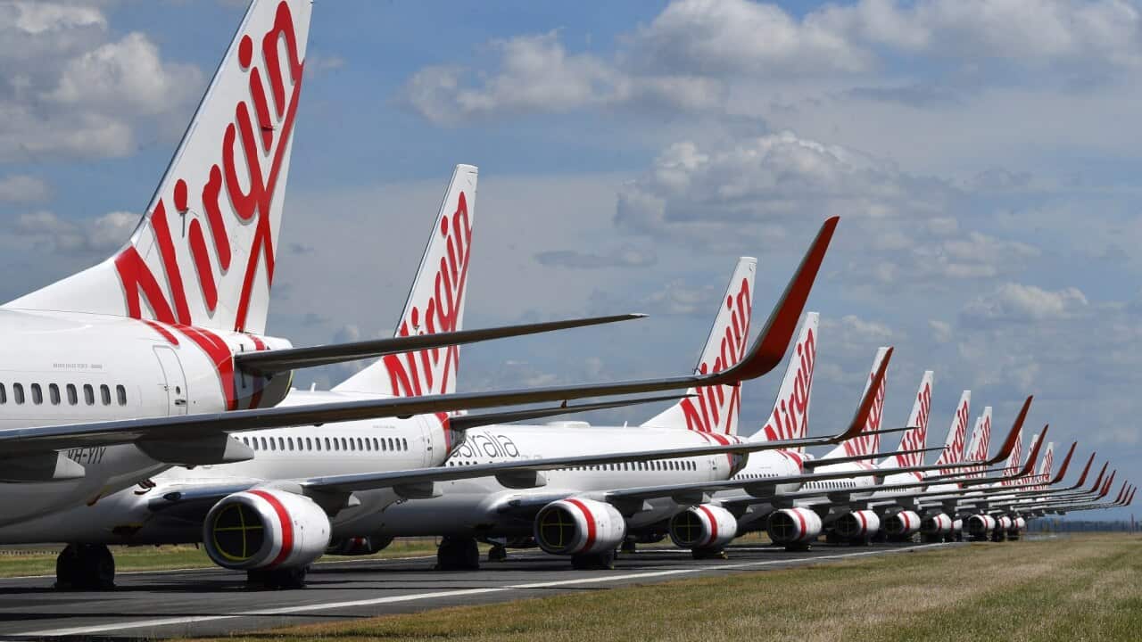 Grounded Virgin Australia aircraft seen parked at Brisbane Airport.