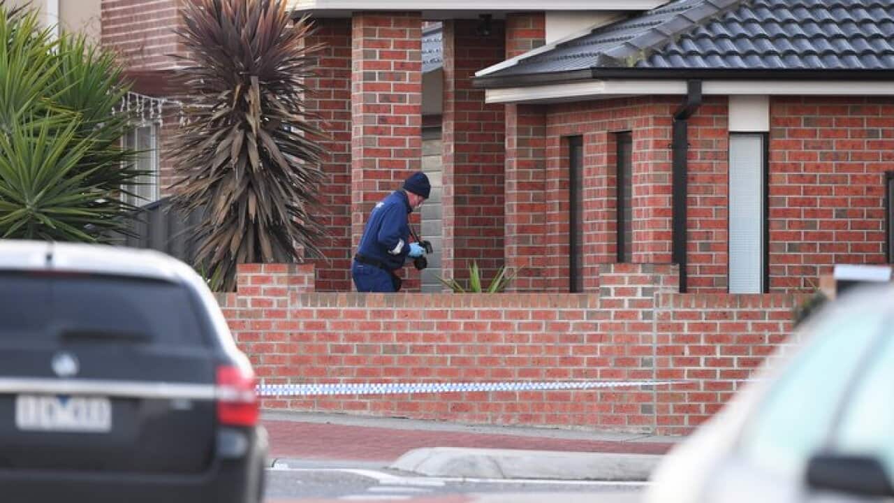 Victoria Police at the scene of a shooting at a home in Roxburgh Park, north of Melbourne, Wednesday, August 9, 2017. A 21-year-old man has been shot dead in Melbourne's northern suburbs overnight. (AAP Image/Joe Castro) NO ARCHIVING