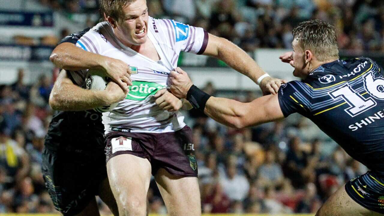 Sea Eagles Jake Trbojevic tackled by Cowboys Sam Hoare