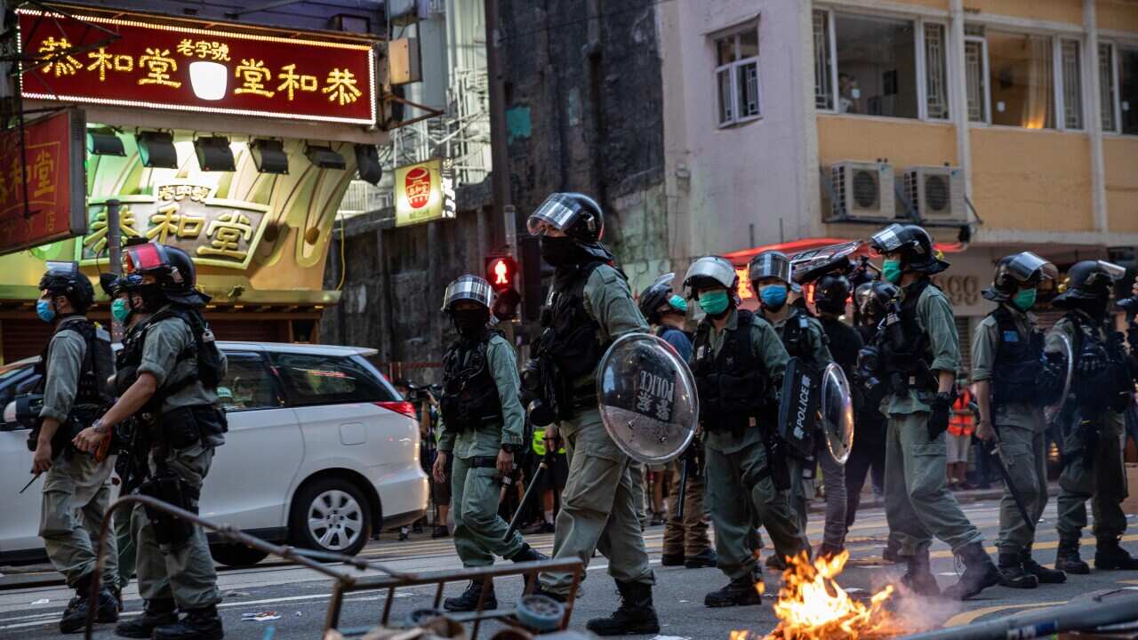 Police and protesters during a Hong Kong rally on July the 1st