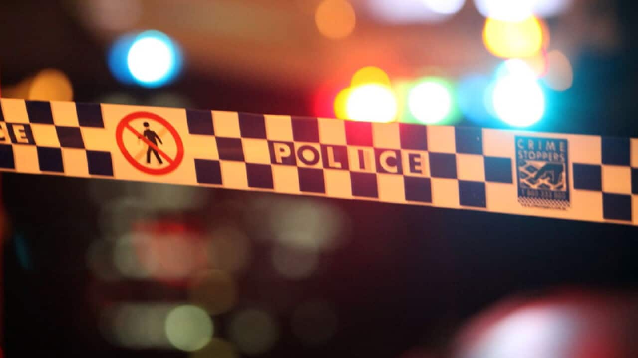 Police at the scene of a fatal shooting