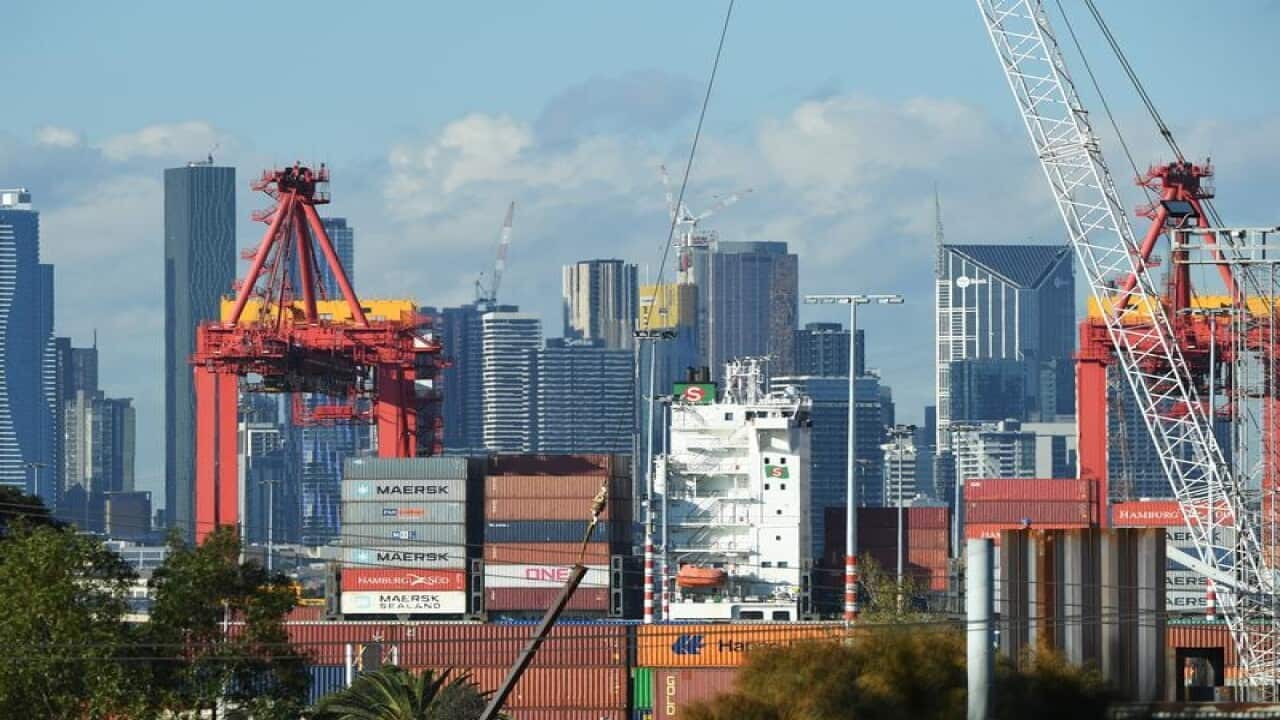 The Melbourne City skyline and the Port of Melbourne.