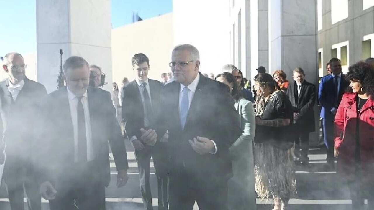 Prime Minister Scott Morrison (R) and Opposition Leader Anthony Albanese at Parliament House. (AAP)