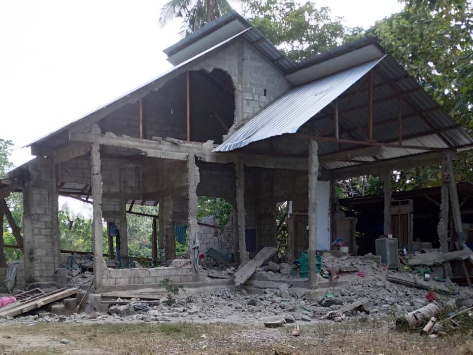 One of the houses damaged by the NTT earthquake on August 15, 2026.