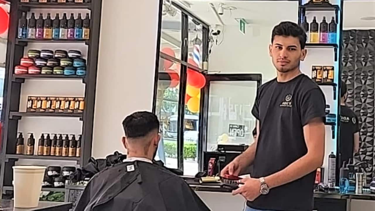 Adil Sulaiman in shop.png