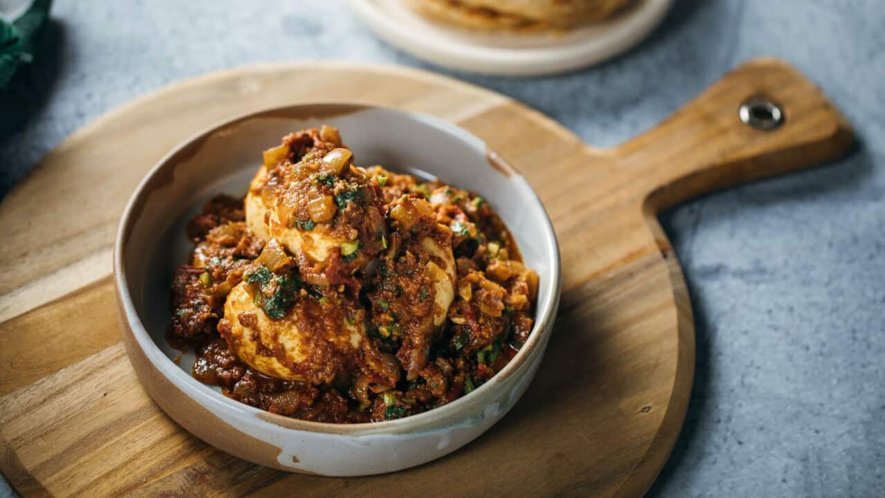 Muttai kozhambu with parothas (Chettinad-style spiced eggs with parothas)
