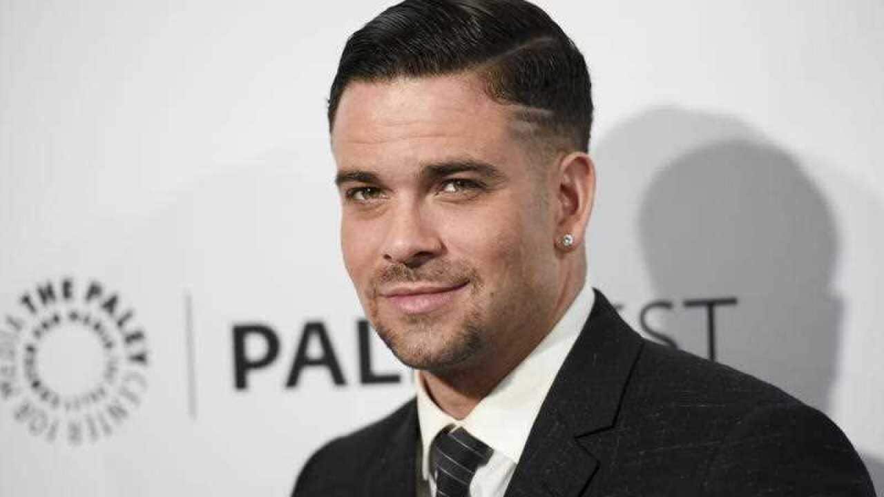 In this March 13, 2015 file photo, Mark Salling arrives at the 32nd annual Paleyfest "Glee" in Los Angeles.