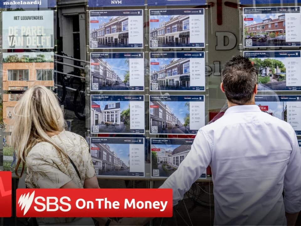 A couple looks at Real estate listings (AAP)