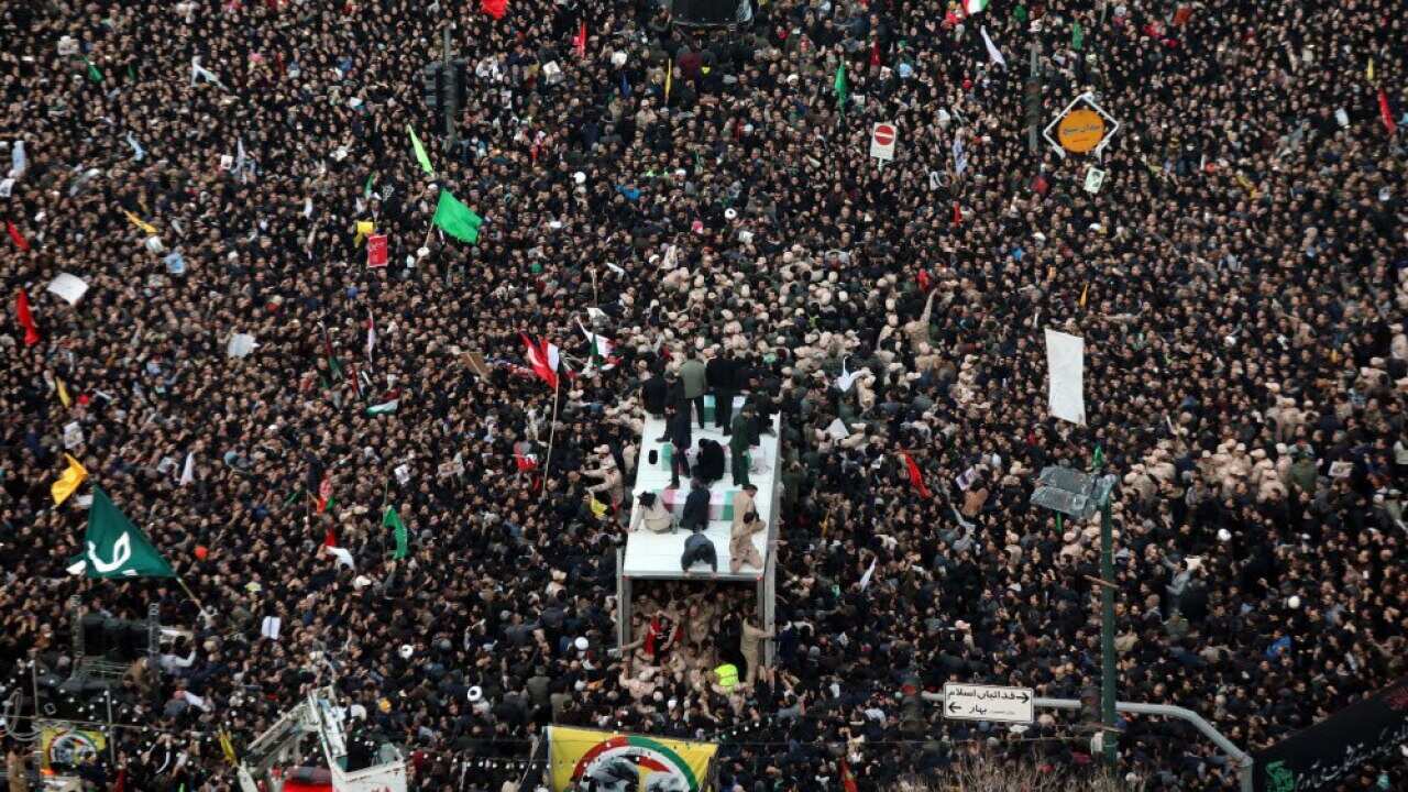 Iranians carrying the coffin of late Iranian general Qasem Soleimani in the city of Mashhad