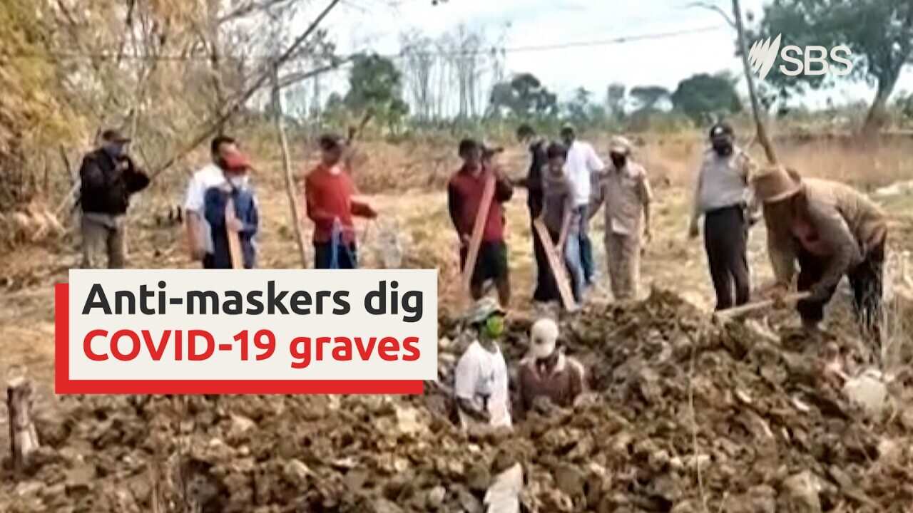 Indonesia punishes anti-maskers by having them dig COVID-19 graves