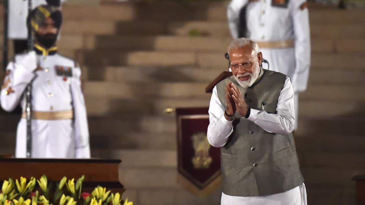 Narendra Modi gestures after taking oath as the Prime Minister of India for second term