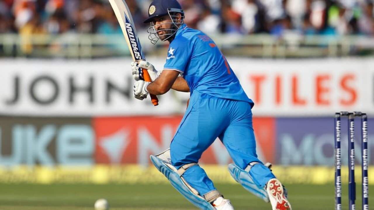 India's captain Mahendra Singh Dhoni plays a shot during the fifth and last one day international cricket match against New Zealand in Visakhapatnam, India, Saturday, Oct. 29, 2016. (AP Photo/Aijaz Rahi)
