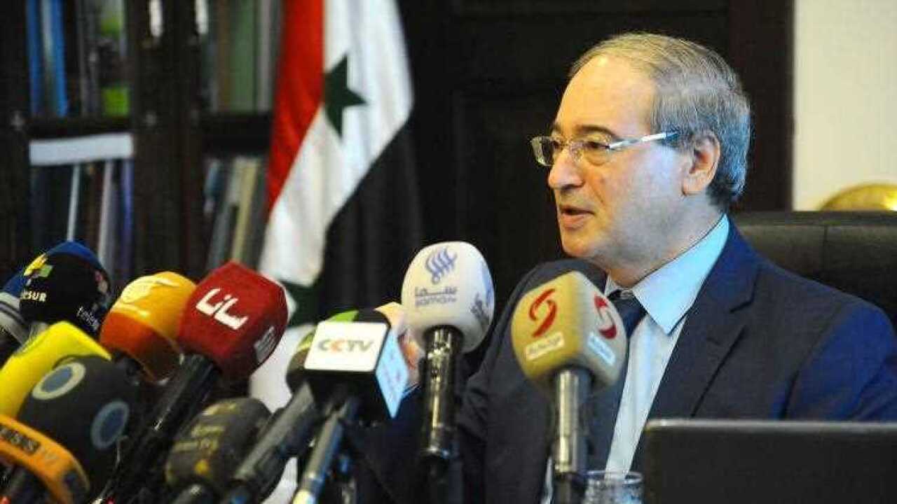 Deputy Syrian Foreign Minister Faisal Mikdad speaking during a press conference in Damascus