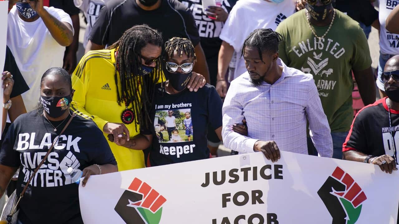 Jacob Blake’s family leads an anti-violence march.