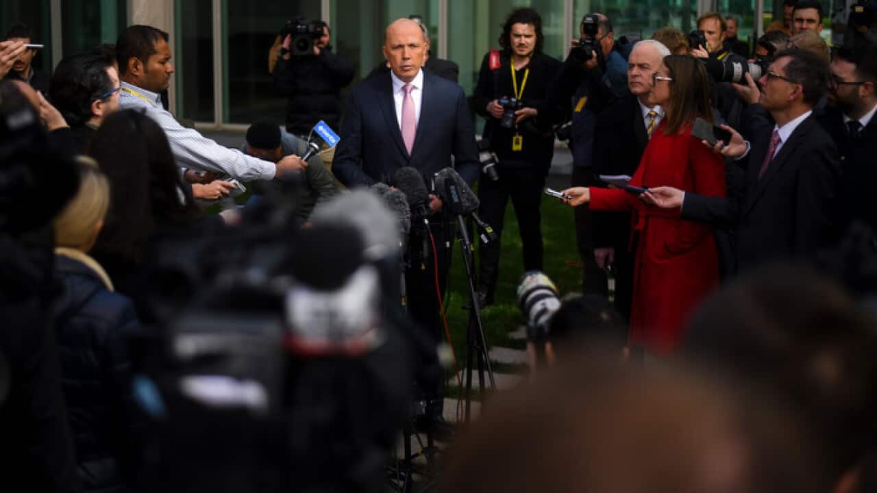 Former Australian Home Affairs Minister Peter Dutton speaks to the media during a press conference at Parliament House in Canberra, Tuesday, August 21, 2018. (AAP Image/Lukas Coch) NO ARCHIVING