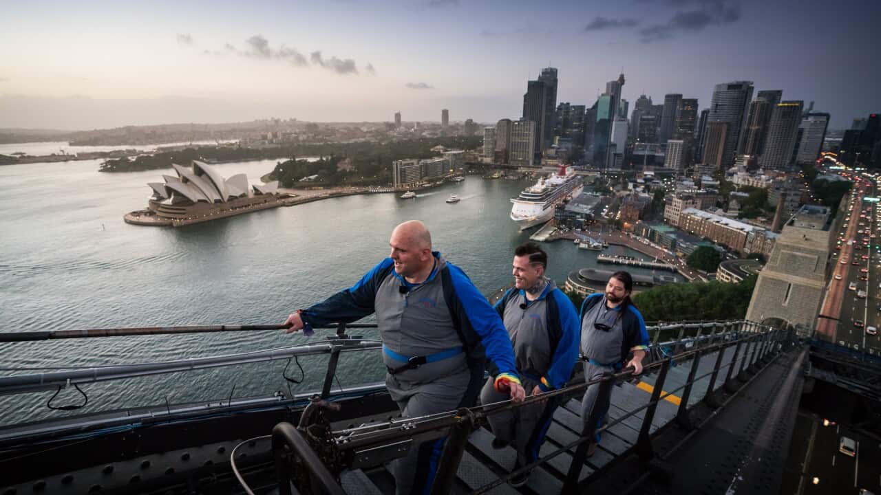 Paul Phillips and Warren Orlandi climb the Sydney Harbour Bridge.