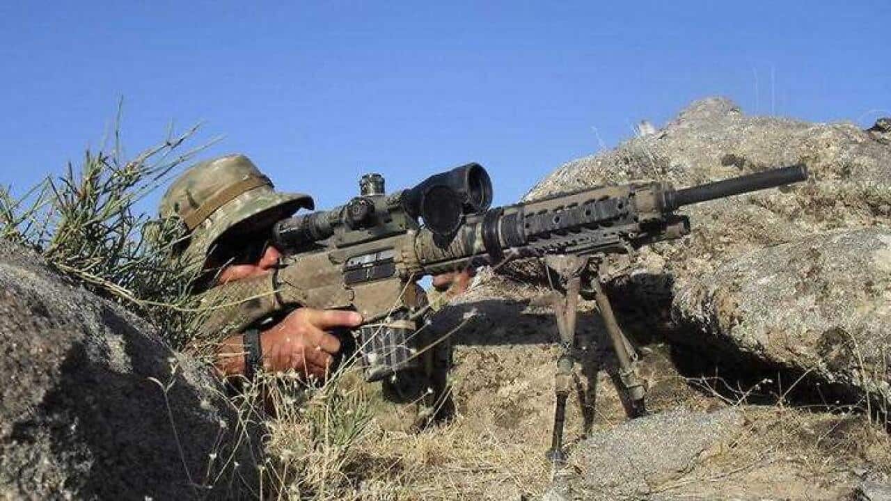 An Australian Special Operations Task Group soldier takes aim during the Shah Wali Kot Offensive in Afghanistan.