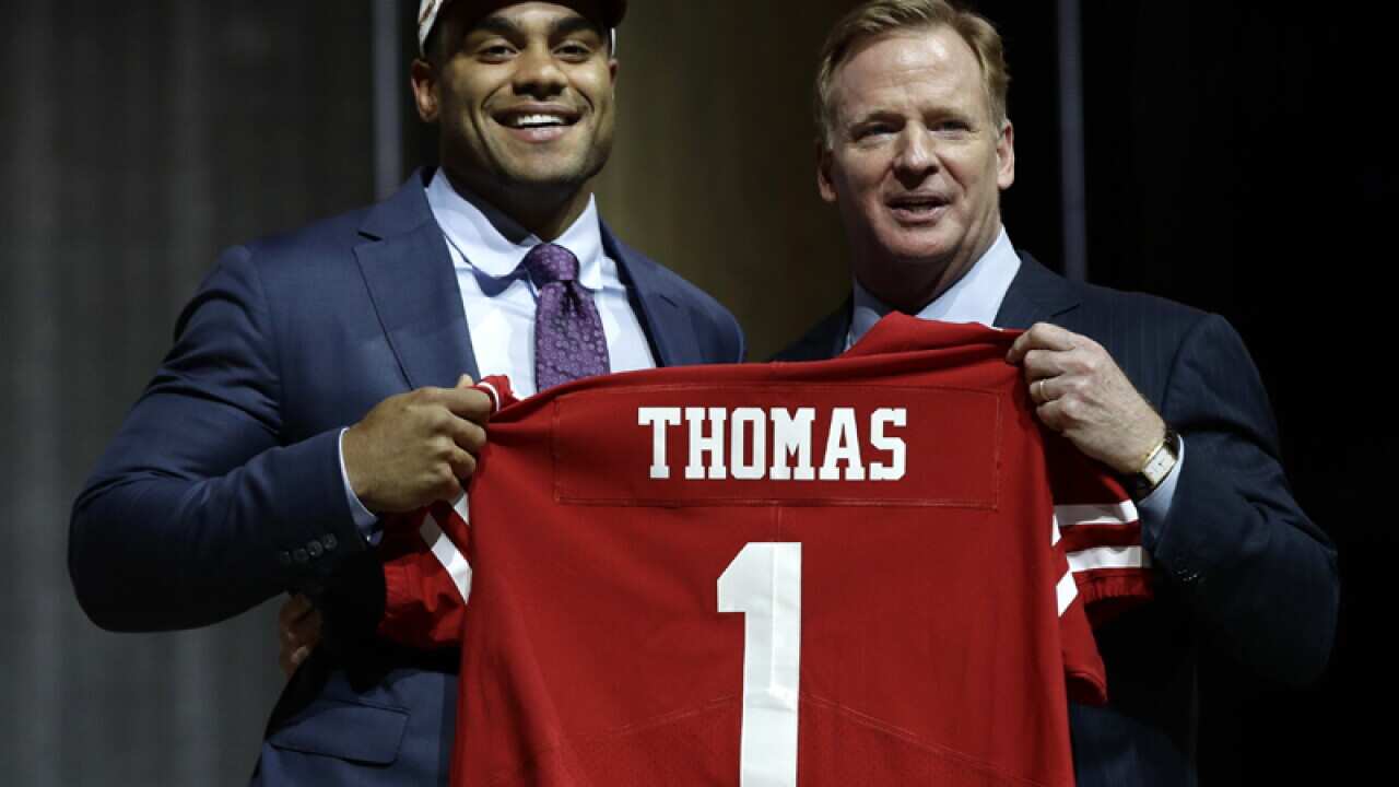 Stanford's Solomon Thomas (L) with NFL Commissioner Roger Goodell