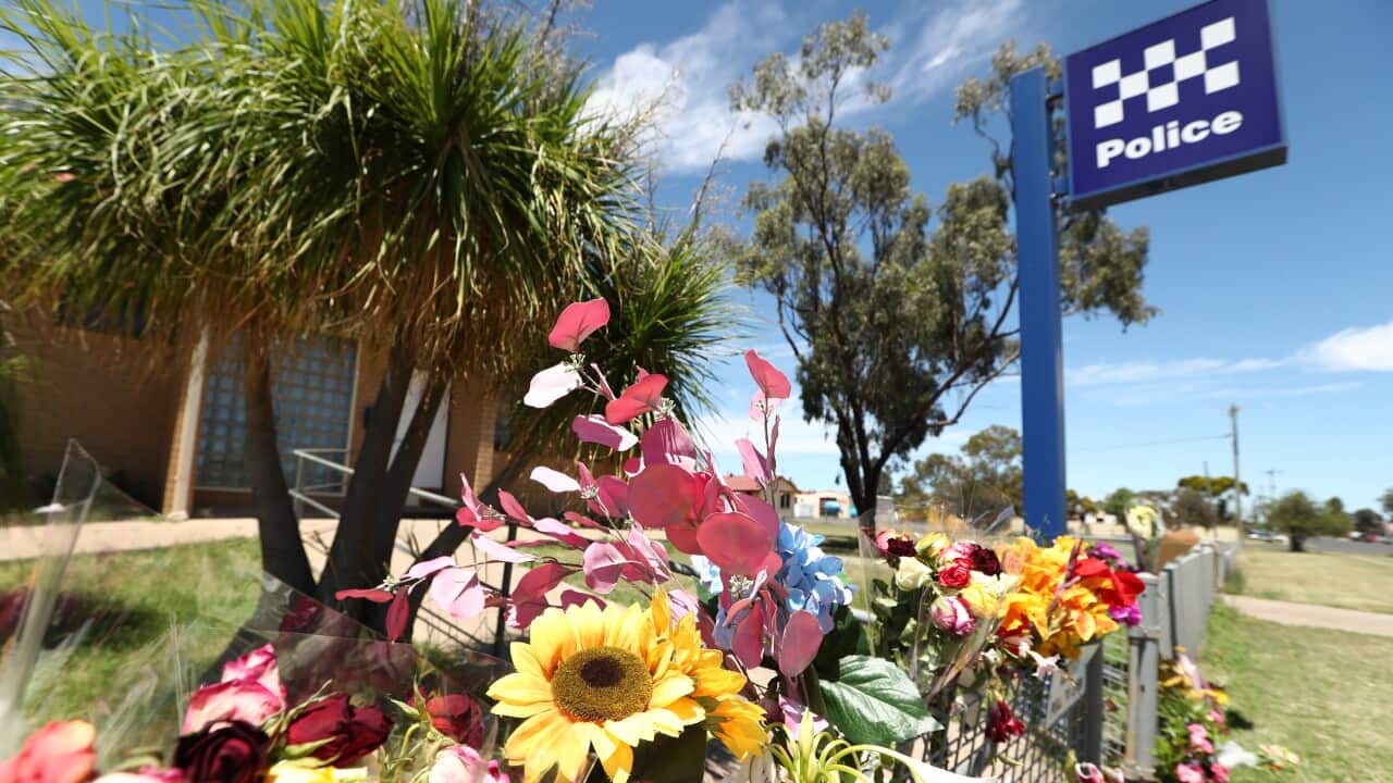 Flowers outside a police station