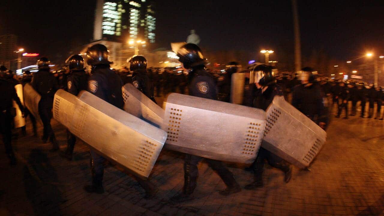 Riot police gather to prevent clashes between pro-Ukrainian and pro-Russian activists during a rally in central Donetsk - AAP-1.jpg