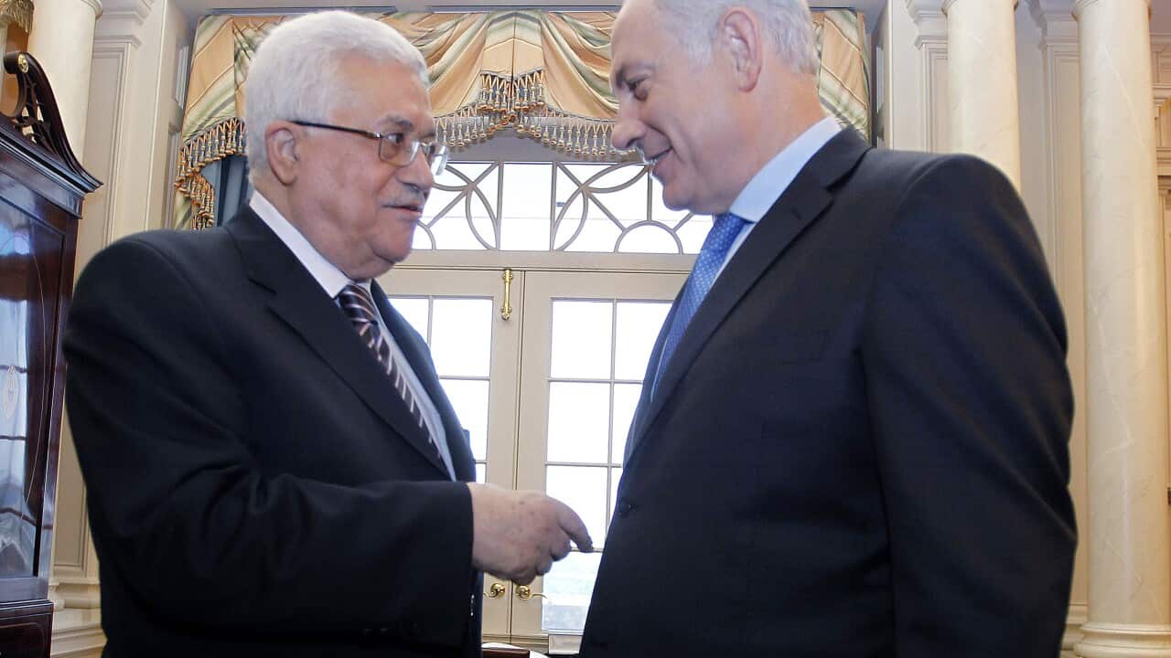 Israeli Prime Minister Benjamin Netanyahu talks with Palestinian President Mahmoud Abbas at the State Department in Washington, Thursday, Sept. 2, 2010, before attending their direct talks aimed at peace in the Middle East. (AP Photo/Jason Reed, Pool)