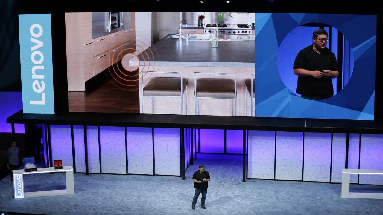 Johnny Lee, Engineering Director of Google Tango, talks about the room sensing features of the Phab2 Pro phone during the keynote address at Lenovo Tech World event Thursday, June 9, 2016, in San Francisco. A Lenovo smartphone unveiled Thursday will be cl