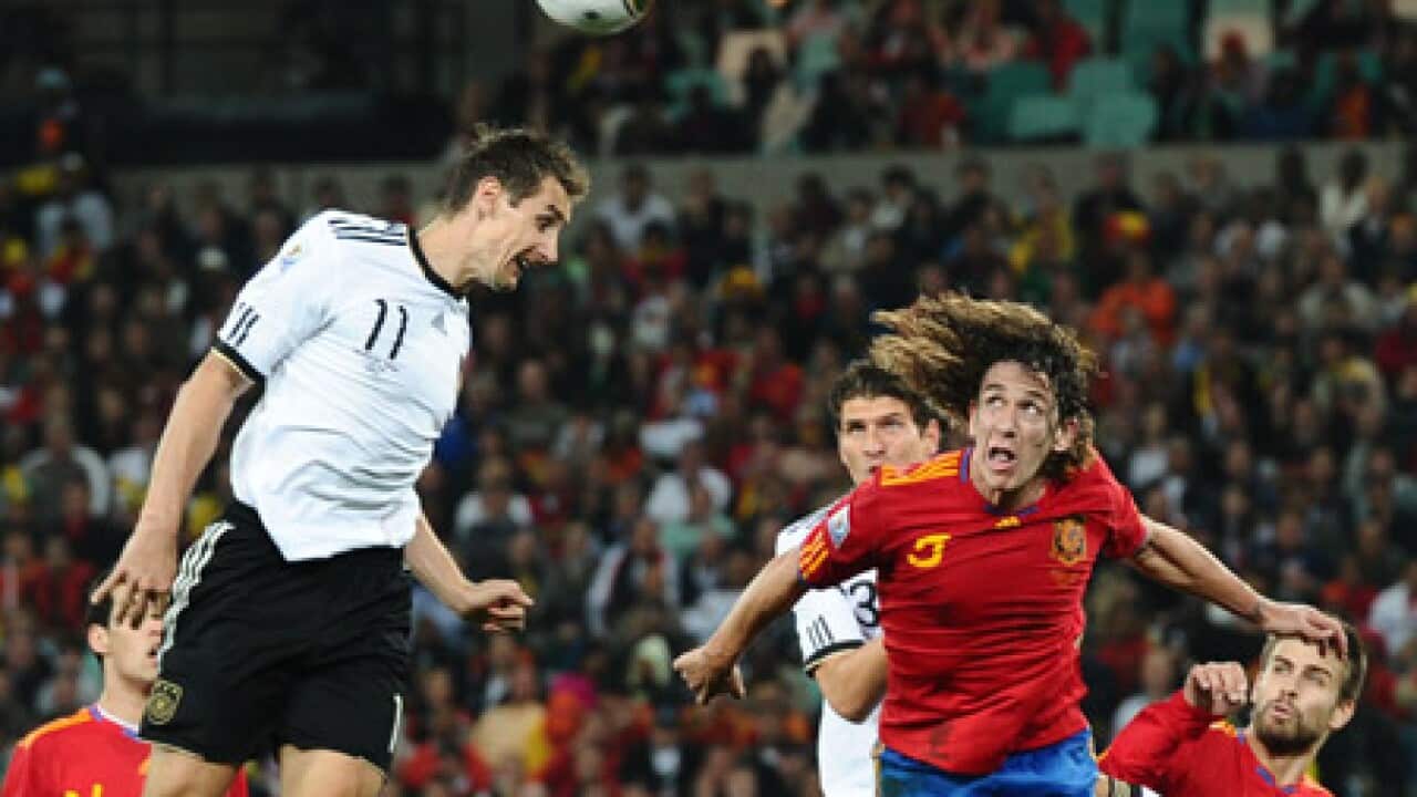 puyol_header_worldcupsemi_100708_B_getty_1201556201