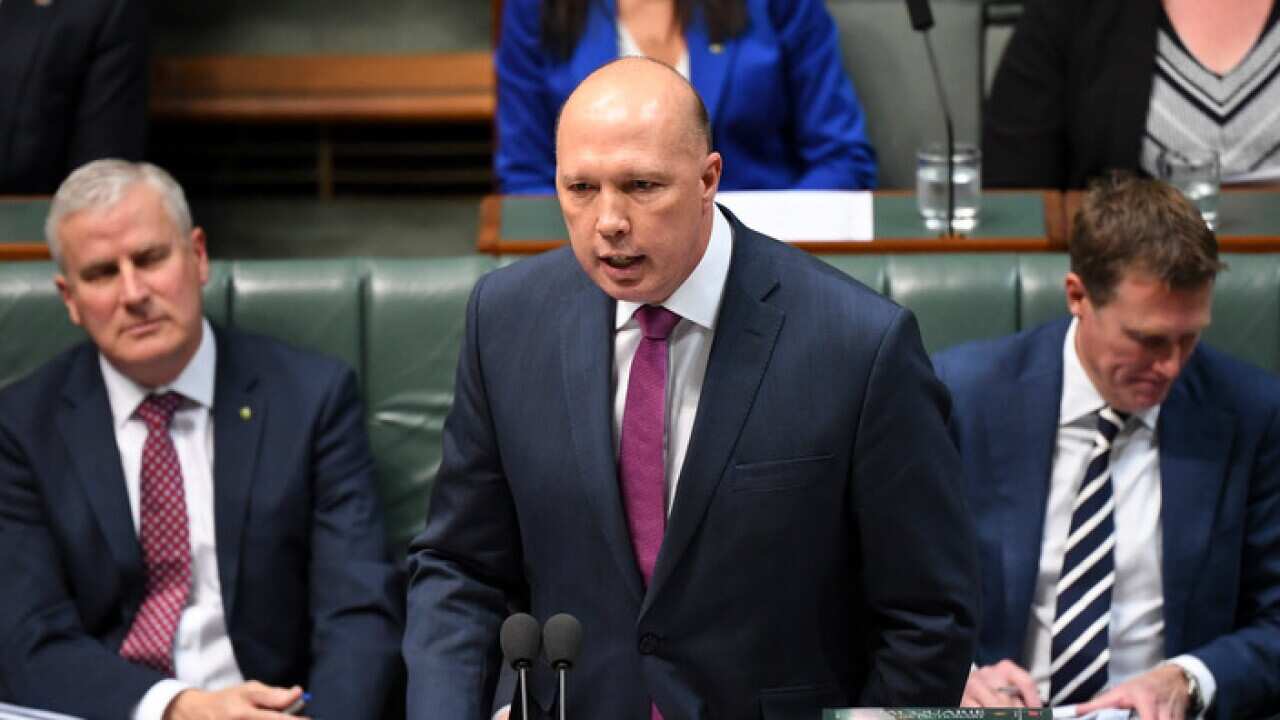 Home Affairs Minister Peter Dutton speaks during Question Time