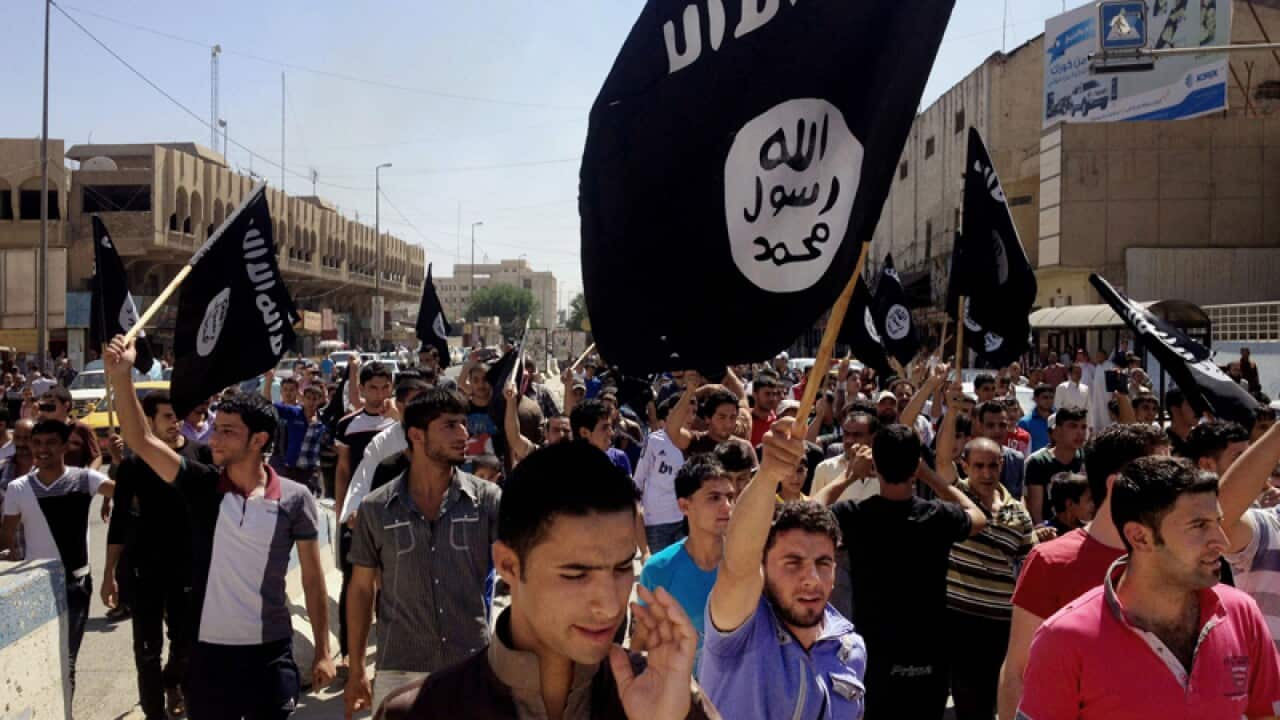 Demonstrators shout slogans to support al-Qaeda inspired ISIS