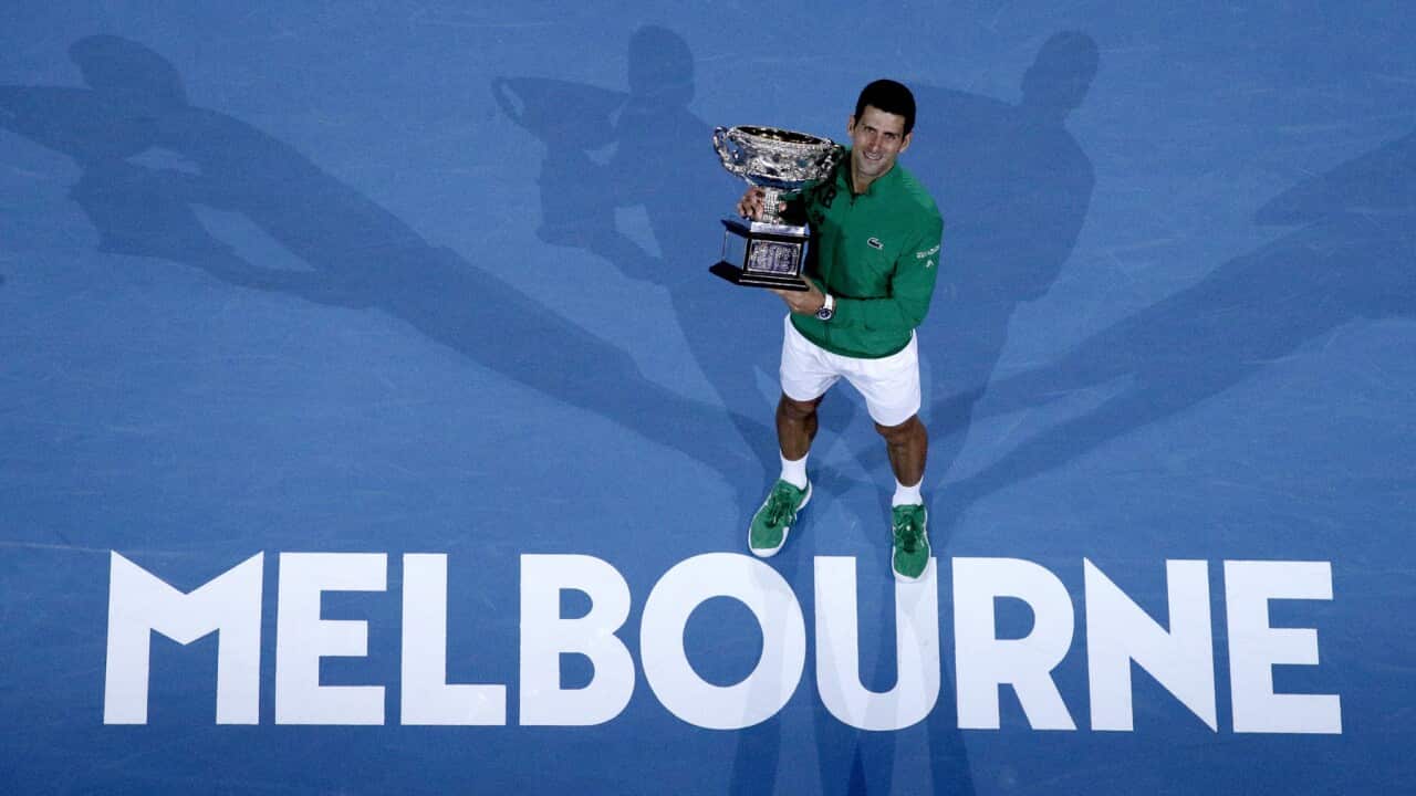 Novak Djokovic holds Australian Open Trophy