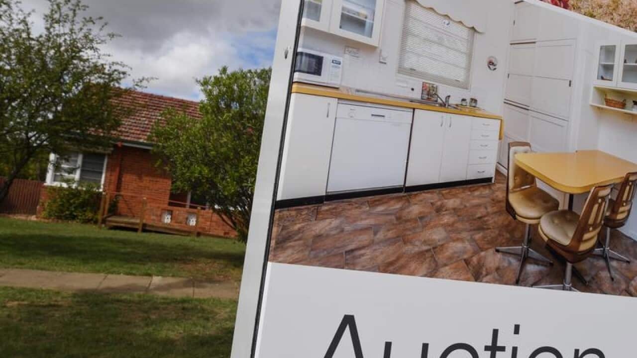 A real estate advertising board